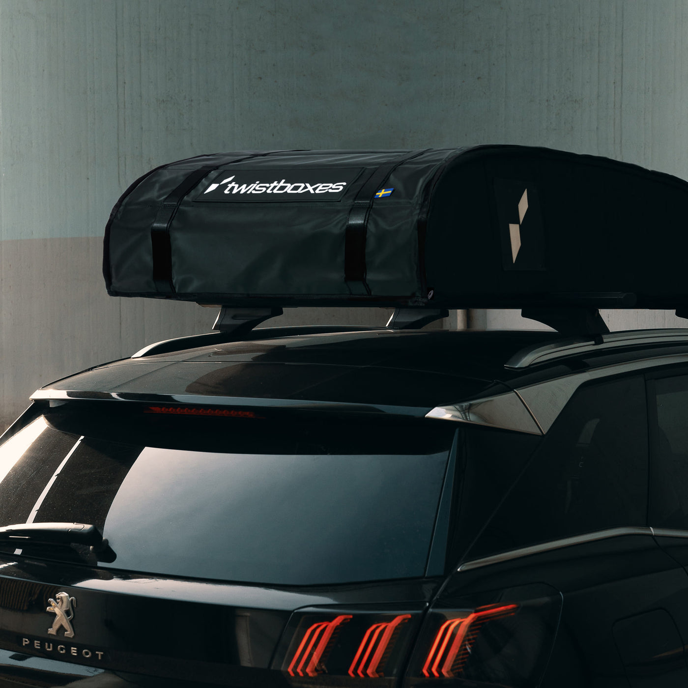 Twistboxes roof box close-up showing unfolded structure and build quality